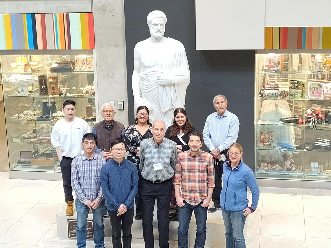 Members of the Schryvers' lab pose for a photo in the Health Sciences Centre atrium. 