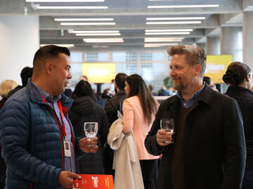 CBC EyeOpener host Loren McGinnis (right) speaks with a colleague